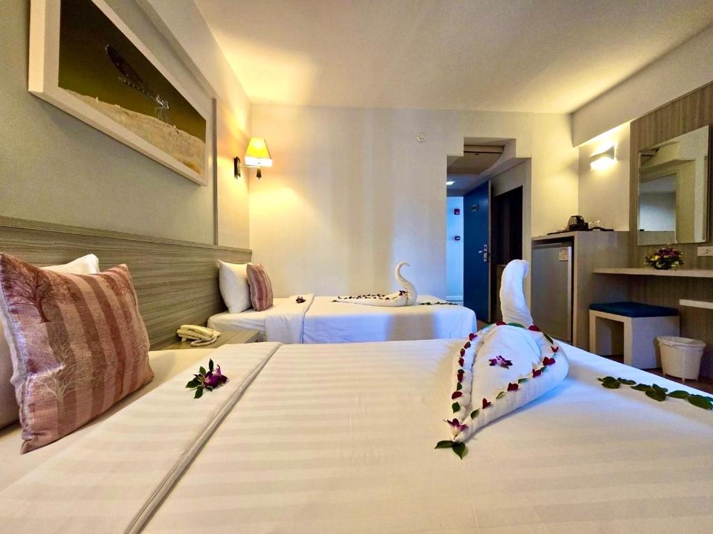 Postel nebo postele na pokoji v ubytování ON Hotel Phuket - SHA