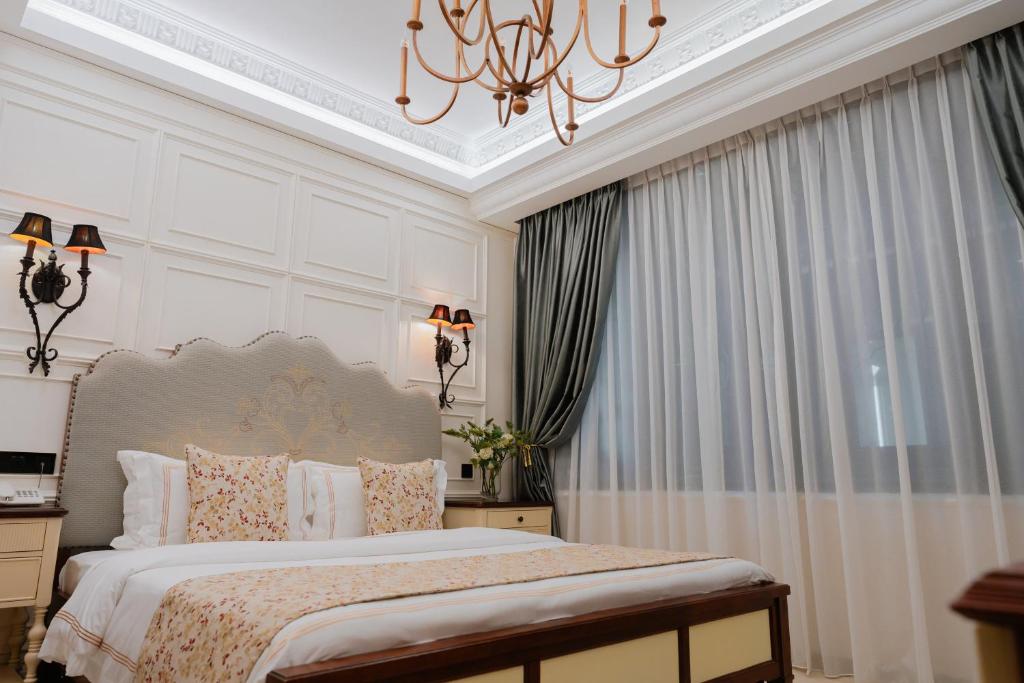 Postel nebo postele na pokoji v ubytování Midori Concept Hotel
