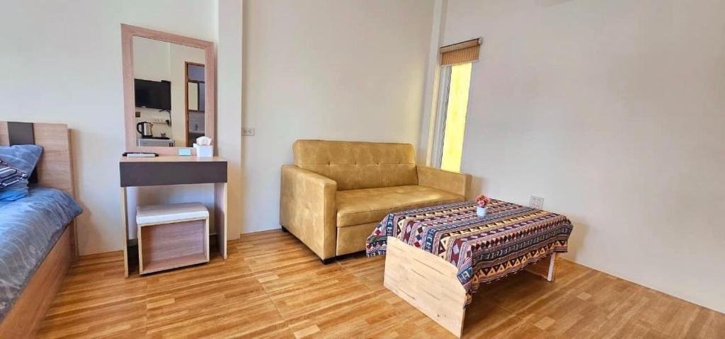 Posezení v ubytování HomDoiIntr Farmstay ฮ่อมดอยอินทร์ ฟาร์มสเตย์