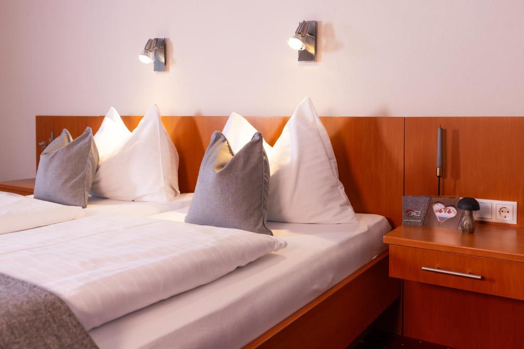 Postel nebo postele na pokoji v ubytování Gästehaus Pilz Schladming