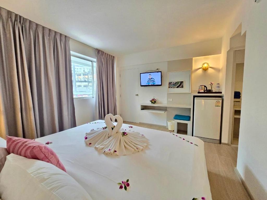 Postel nebo postele na pokoji v ubytování ON Hotel Phuket - SHA