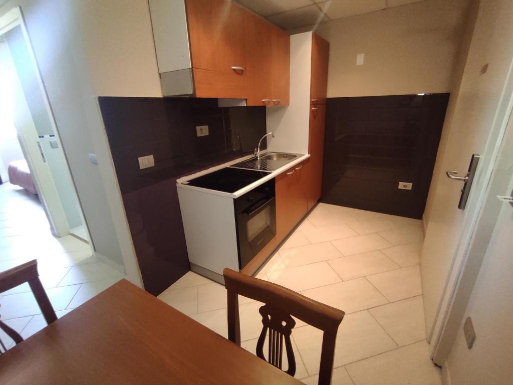 Kuchyň nebo kuchyňský kout v ubytování Standard Hotel Udine