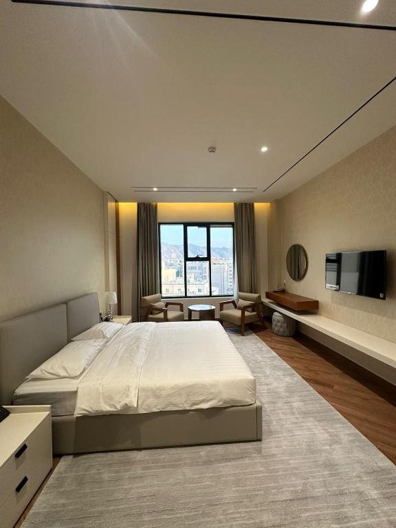 Postel nebo postele na pokoji v ubytování فندق الياس - Yas Hotel