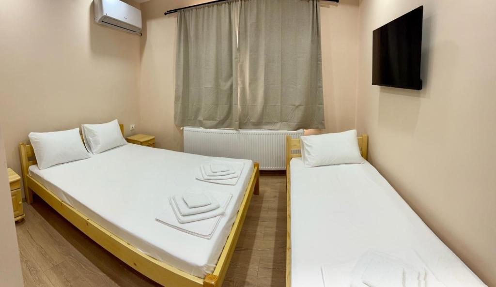 Postel nebo postele na pokoji v ubytování Петропавловската Къща