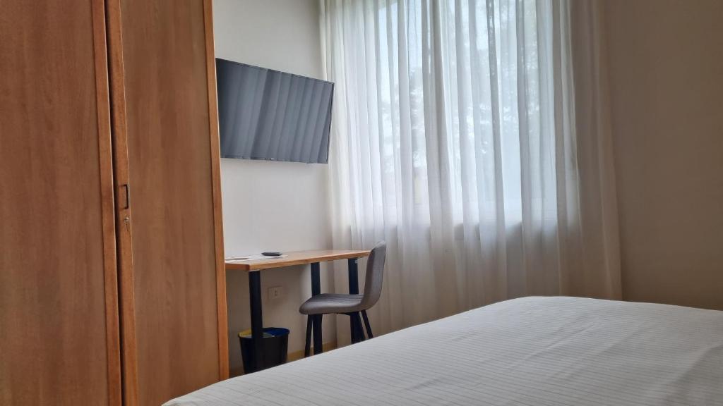 TV a/nebo společenská místnost v ubytování Phi Hotel Homy Druento