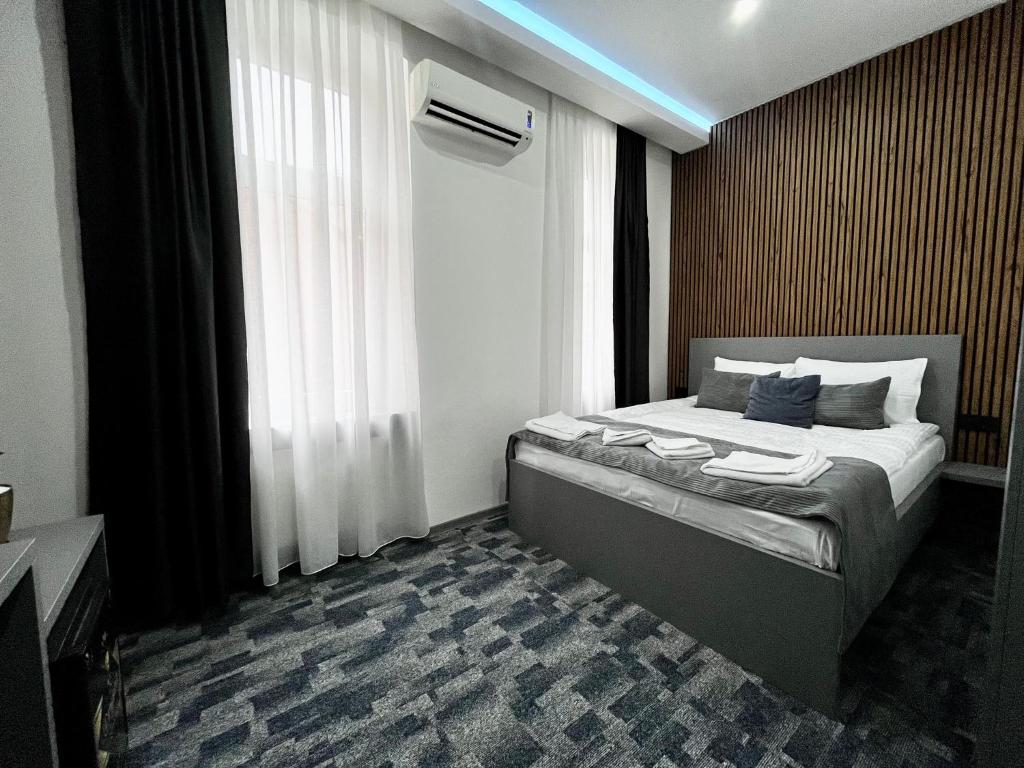 Postel nebo postele na pokoji v ubytování Residence Inn Orijent