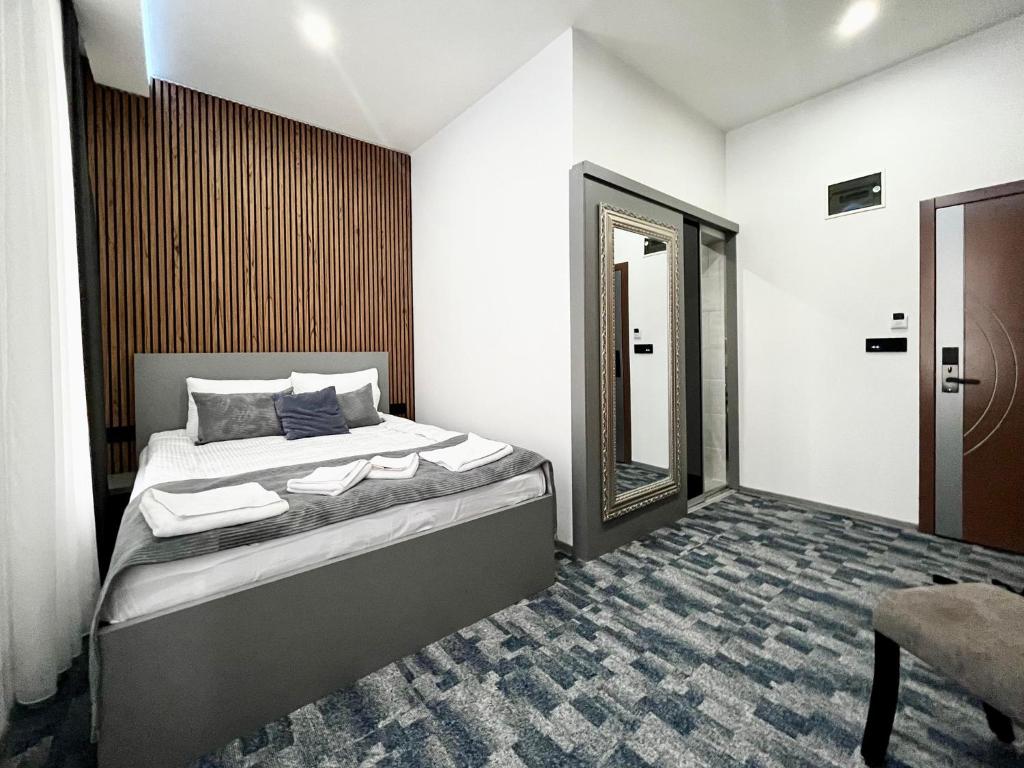 Postel nebo postele na pokoji v ubytování Residence Inn Orijent