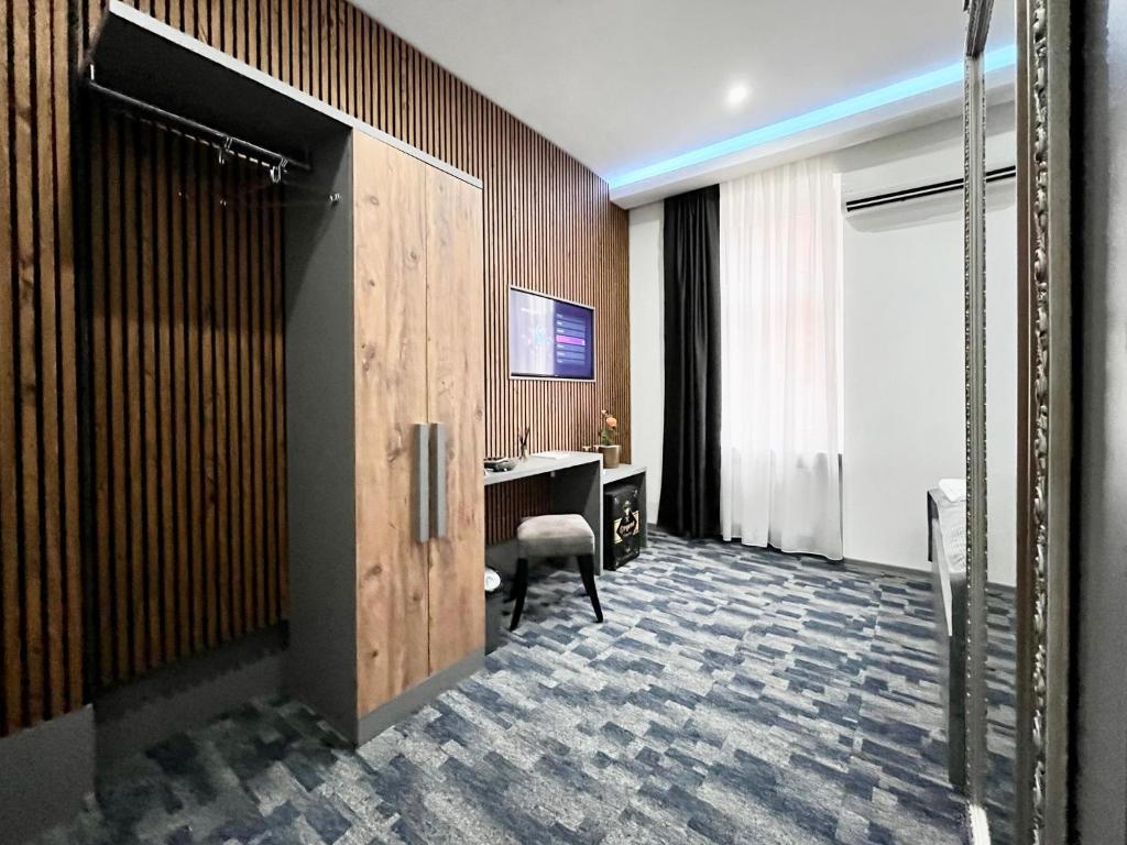 TV a/nebo společenská místnost v ubytování Residence Inn Orijent