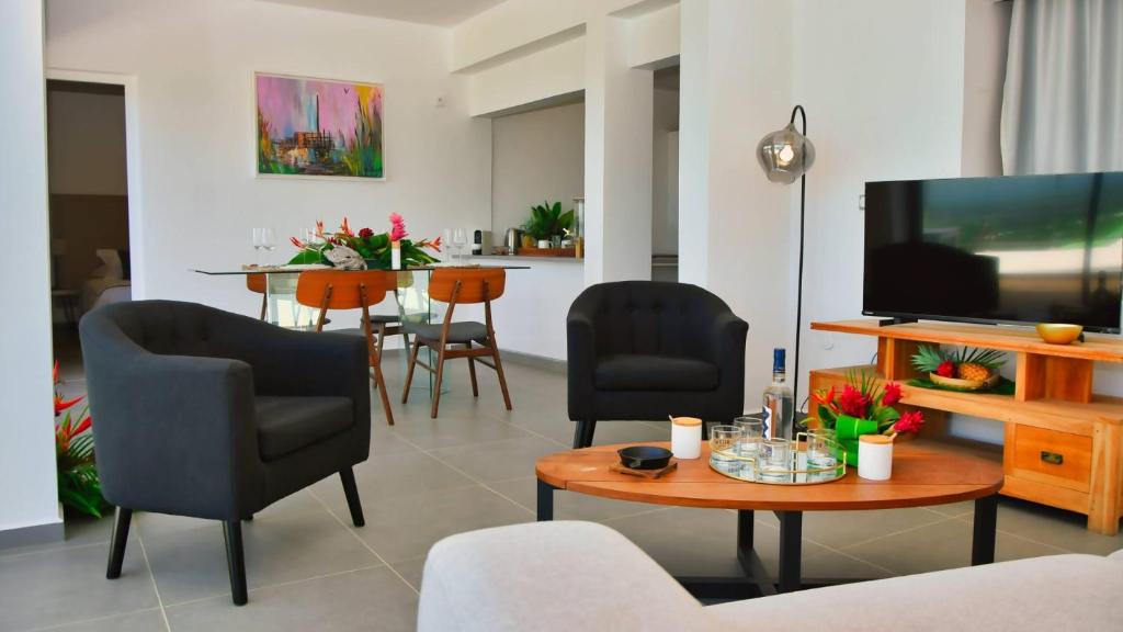 TV a/nebo společenská místnost v ubytování Le Gaetana Hotel