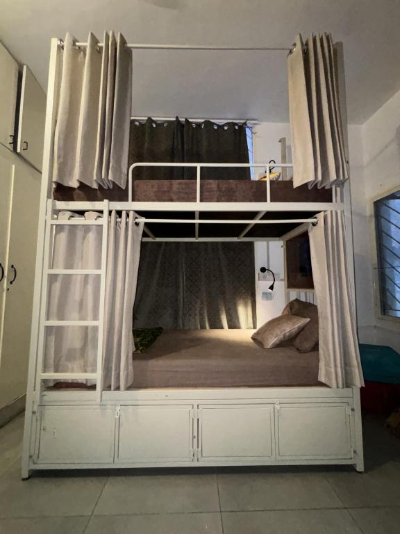 Voodi või voodid majutusasutuse BYOC Hostels - Indiranagar toas