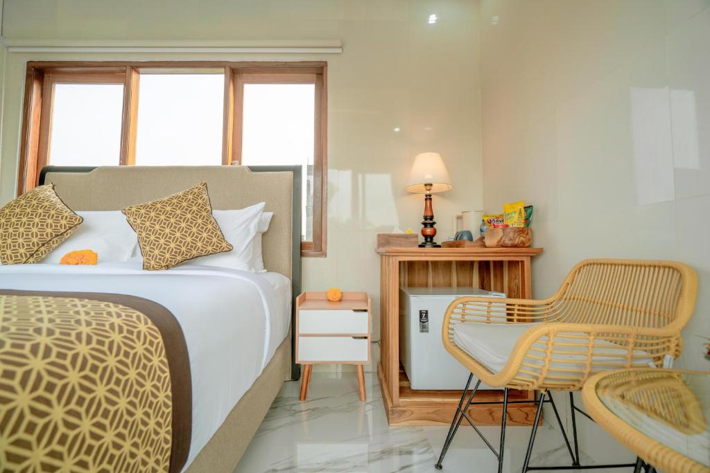 Postel nebo postele na pokoji v ubytování Ashanti Guest House Ubud