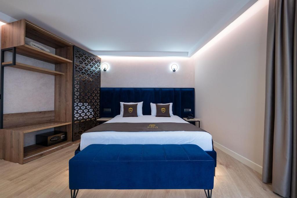 Postel nebo postele na pokoji v ubytování Hotel Dior