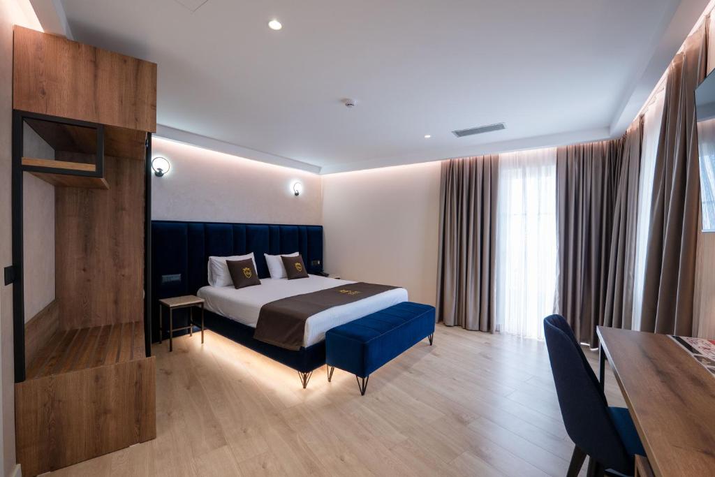 Postel nebo postele na pokoji v ubytování Hotel Dior