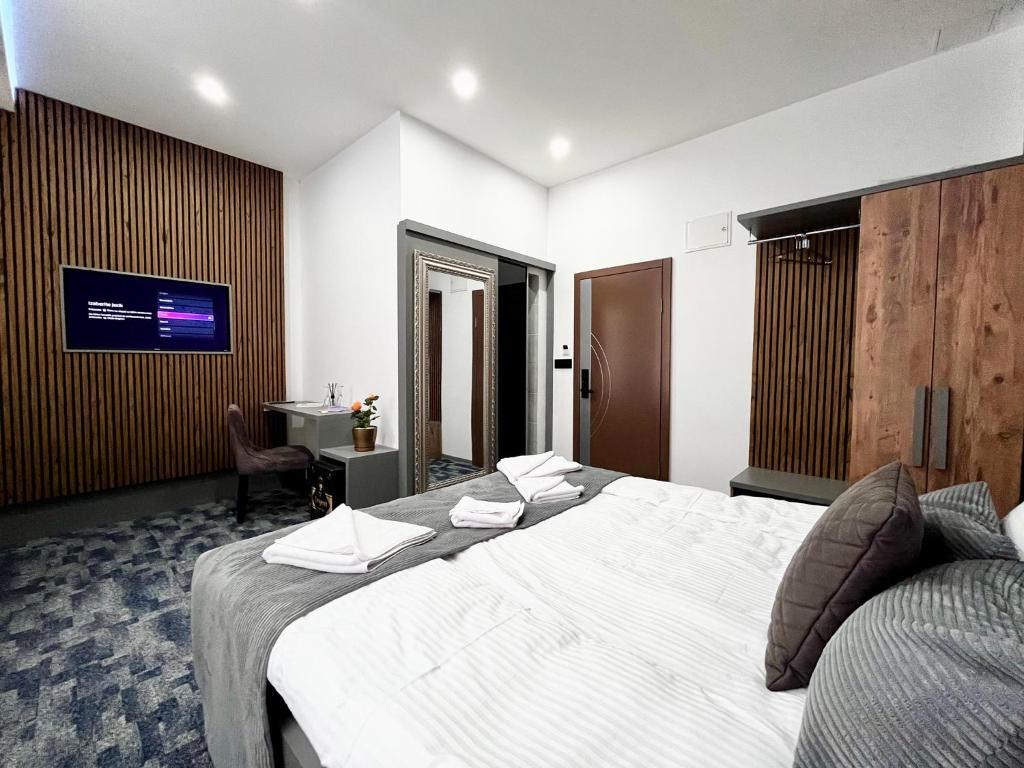 Postel nebo postele na pokoji v ubytování Residence Inn Orijent