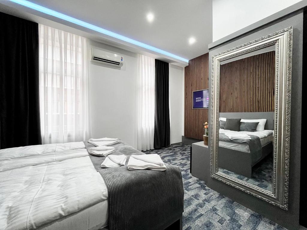 Postel nebo postele na pokoji v ubytování Residence Inn Orijent