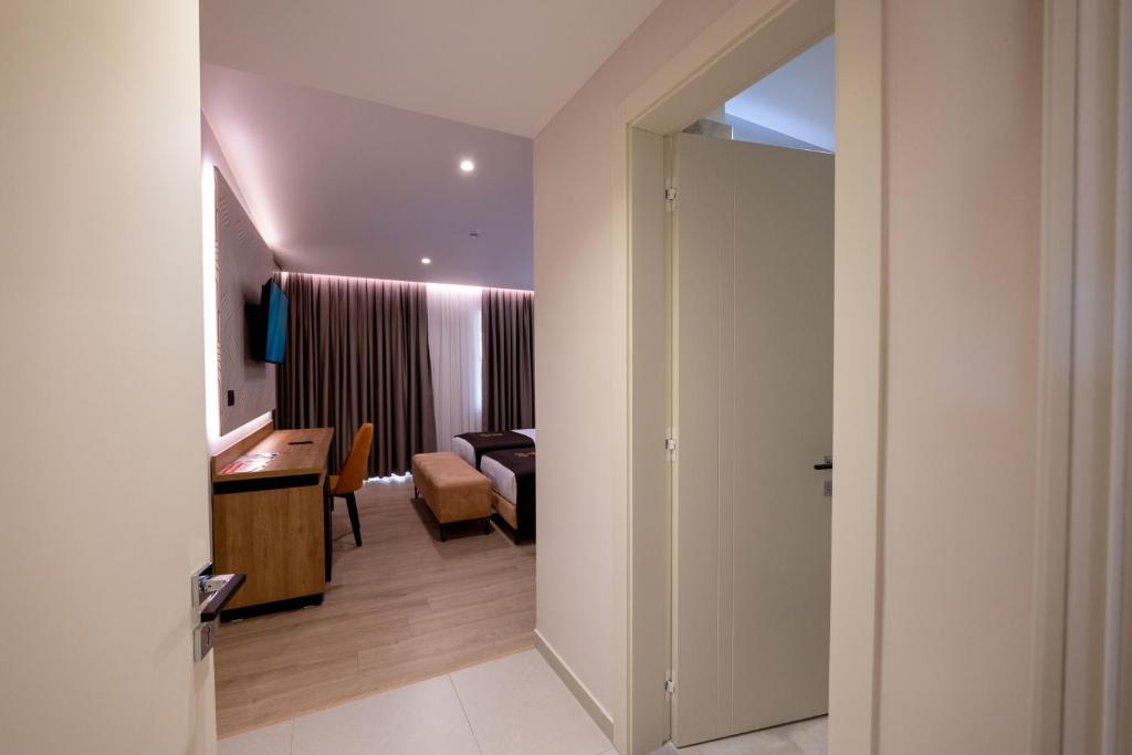 Postel nebo postele na pokoji v ubytování Hotel Dior