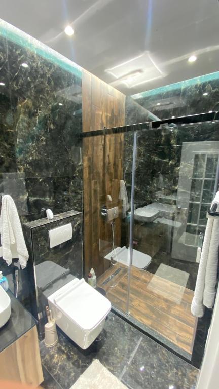 Koupelna v ubytování RentRoom Ajan Apartment
