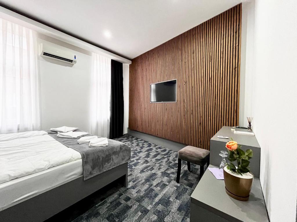 Postel nebo postele na pokoji v ubytování Residence Inn Orijent