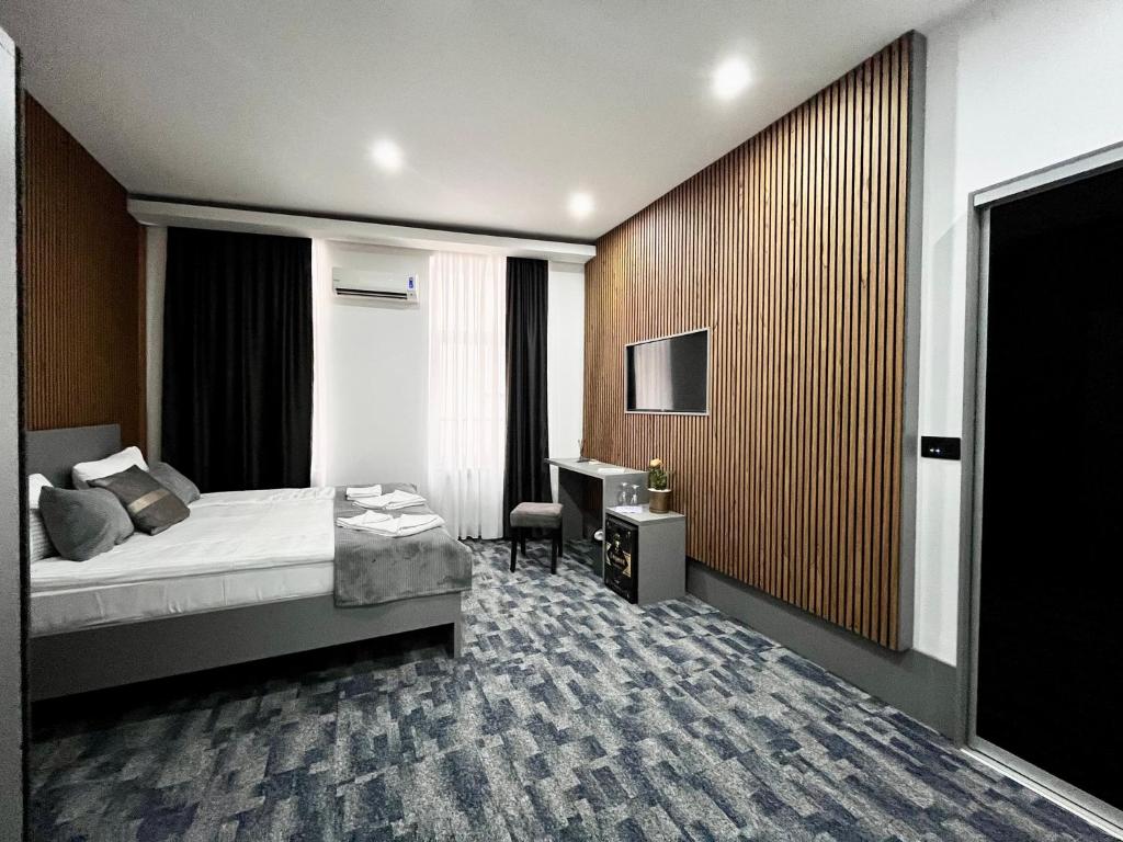 Postel nebo postele na pokoji v ubytování Residence Inn Orijent