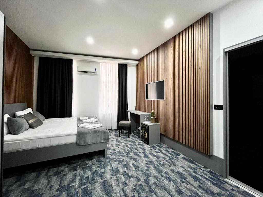 Postel nebo postele na pokoji v ubytování Residence Inn Orijent
