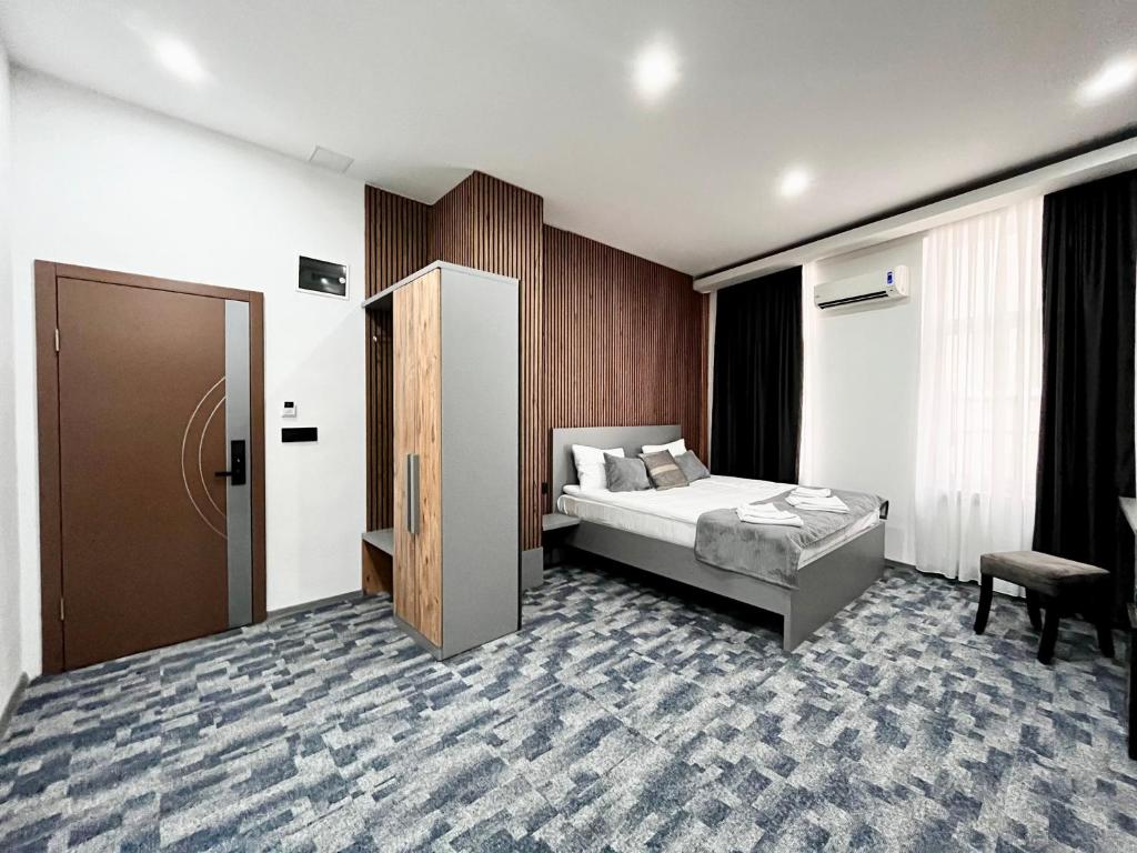 Postel nebo postele na pokoji v ubytování Residence Inn Orijent