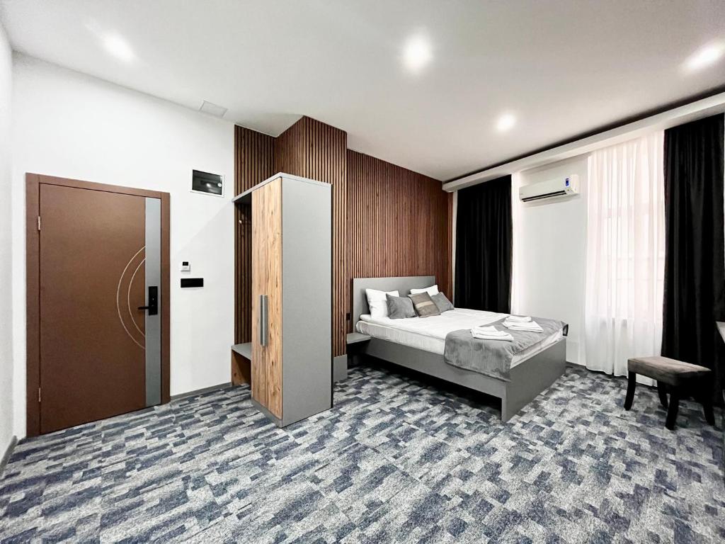 Postel nebo postele na pokoji v ubytování Residence Inn Orijent