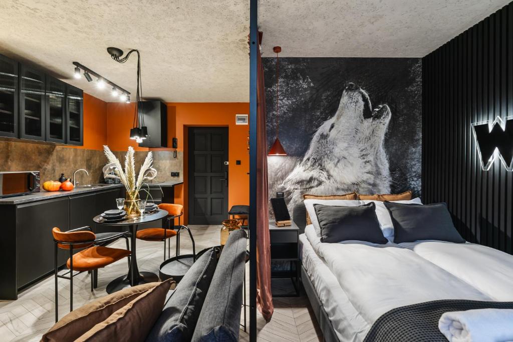 Postel nebo postele na pokoji v ubytování Apartament WOLF