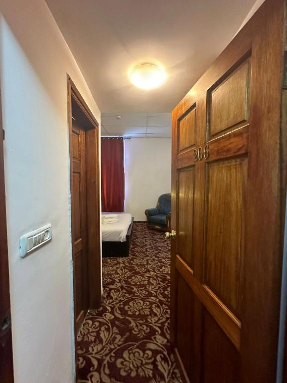 Postel nebo postele na pokoji v ubytování Zion Hotel