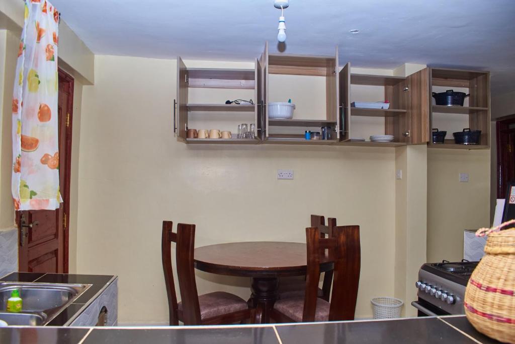Kuchyň nebo kuchyňský kout v ubytování Ligen Suites