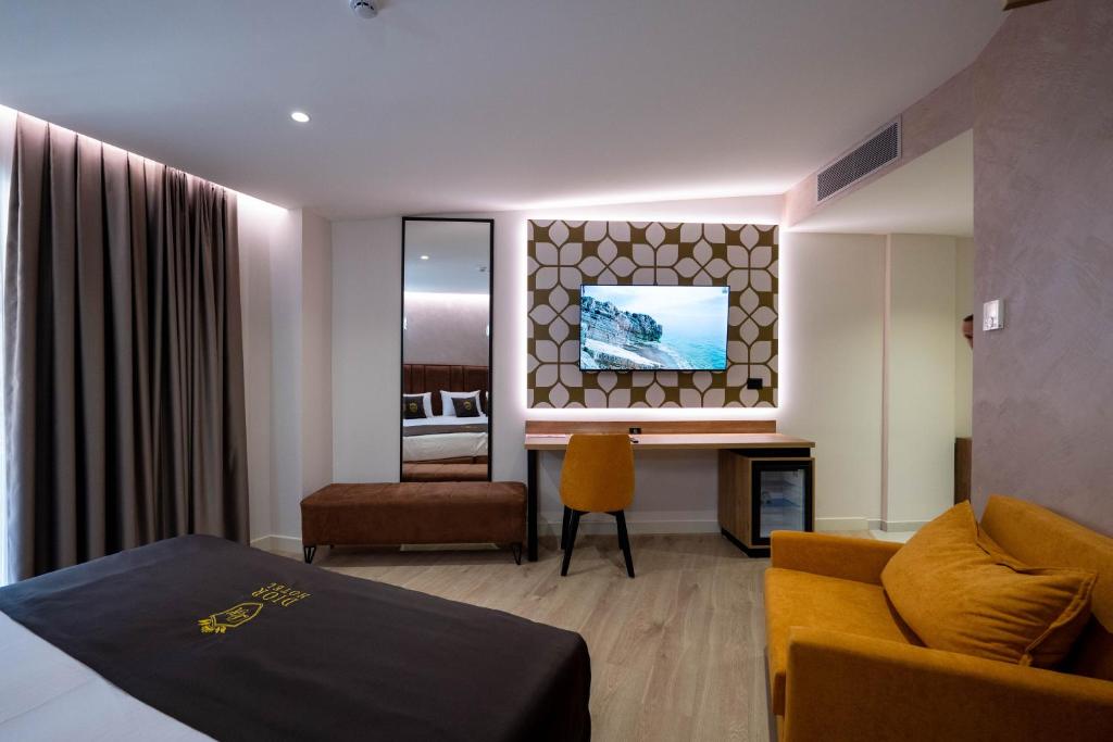 Postel nebo postele na pokoji v ubytování Hotel Dior