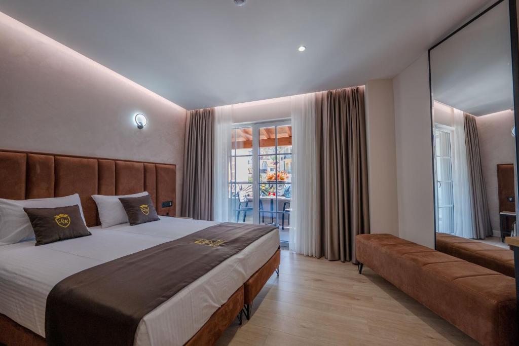 Postel nebo postele na pokoji v ubytování Hotel Dior