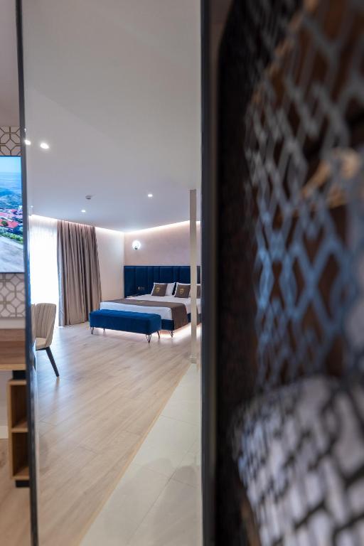 Postel nebo postele na pokoji v ubytování Hotel Dior