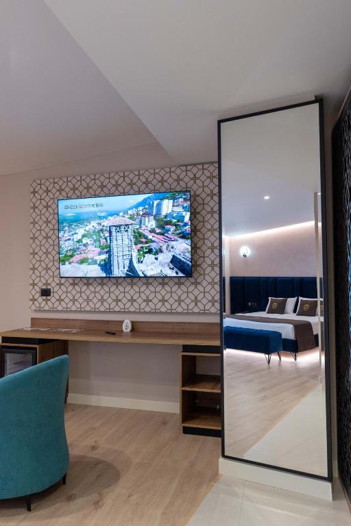 TV a/nebo společenská místnost v ubytování Hotel Dior