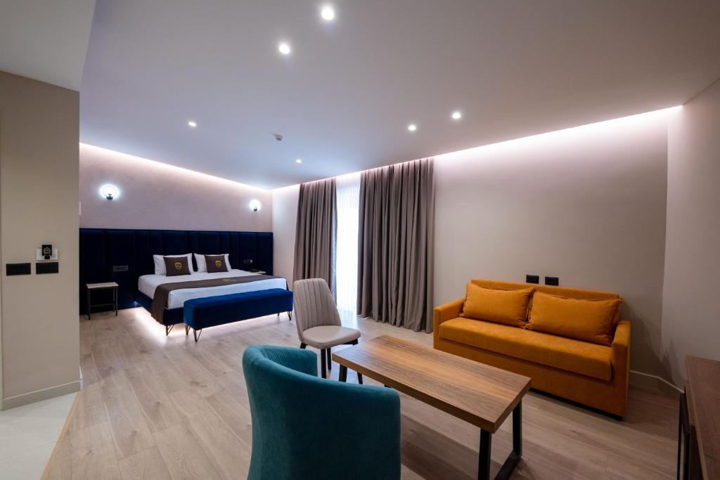 Postel nebo postele na pokoji v ubytování Hotel Dior