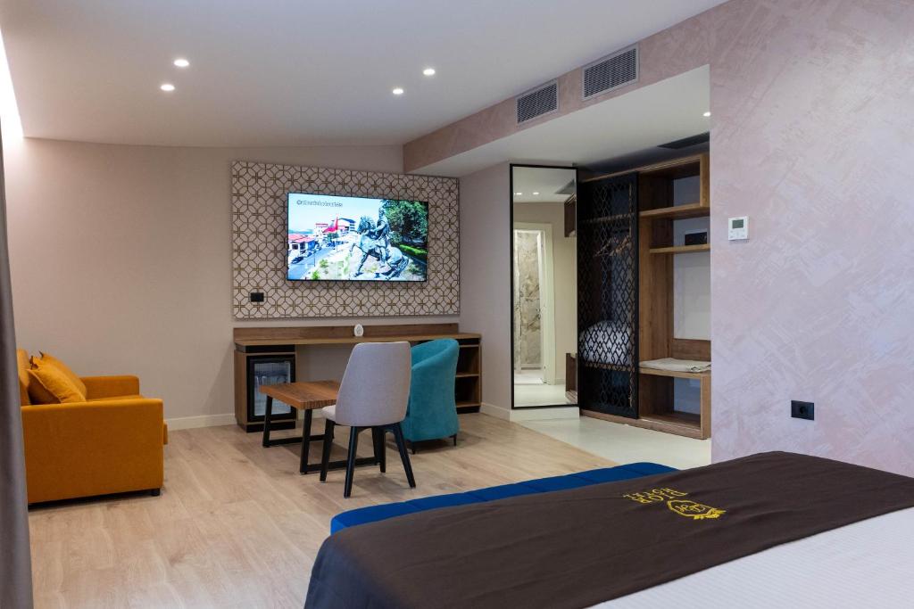 TV a/nebo společenská místnost v ubytování Hotel Dior