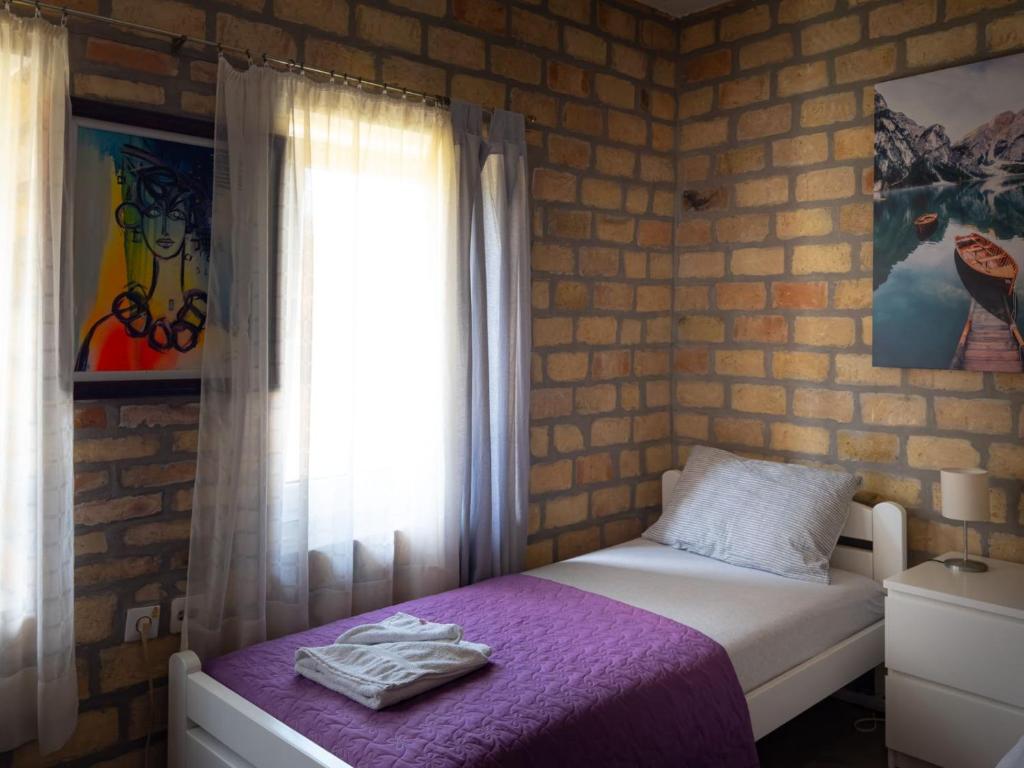 Krevet ili kreveti u jedinici u okviru objekta Bakina kuća