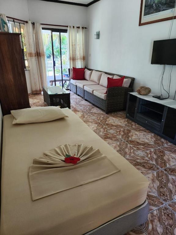 Postel nebo postele na pokoji v ubytování Skyblue Guesthouse - Self Catering