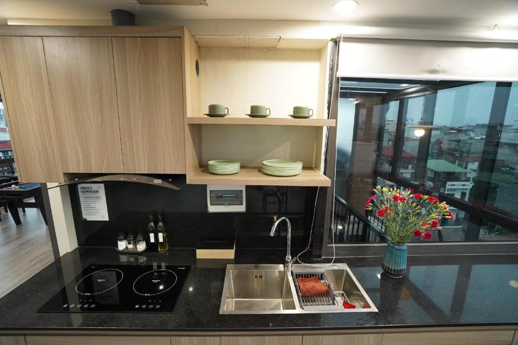 Kuchyň nebo kuchyňský kout v ubytování An Nguyen Boutique Hotel