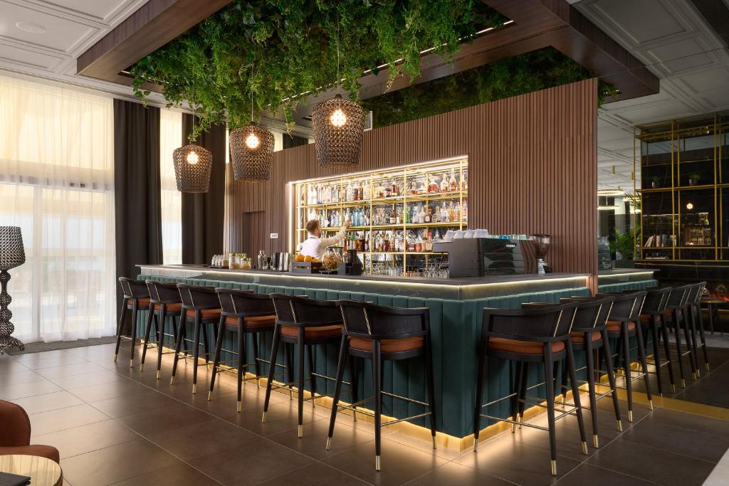 Lounge nebo bar v ubytování Hotel Olympia