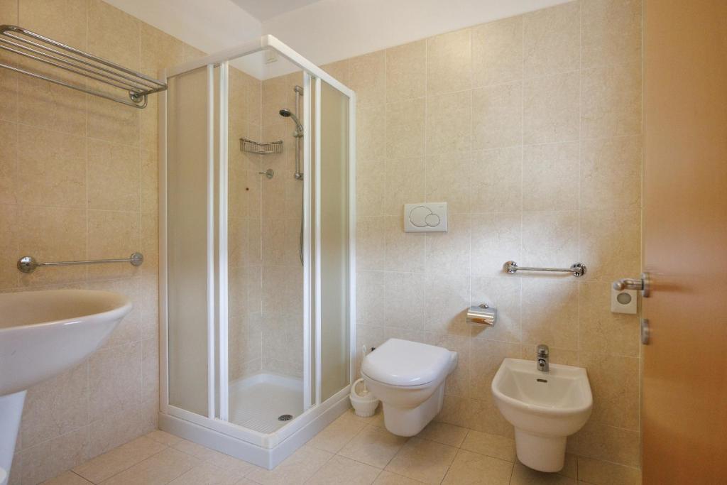 Koupelna v ubytování Club Hotel e Residence La Vela