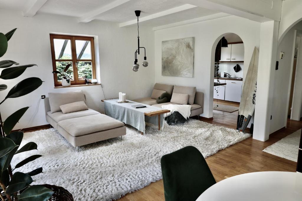 Posezení v ubytování Ferienhaus Flying Roots Wackersberg