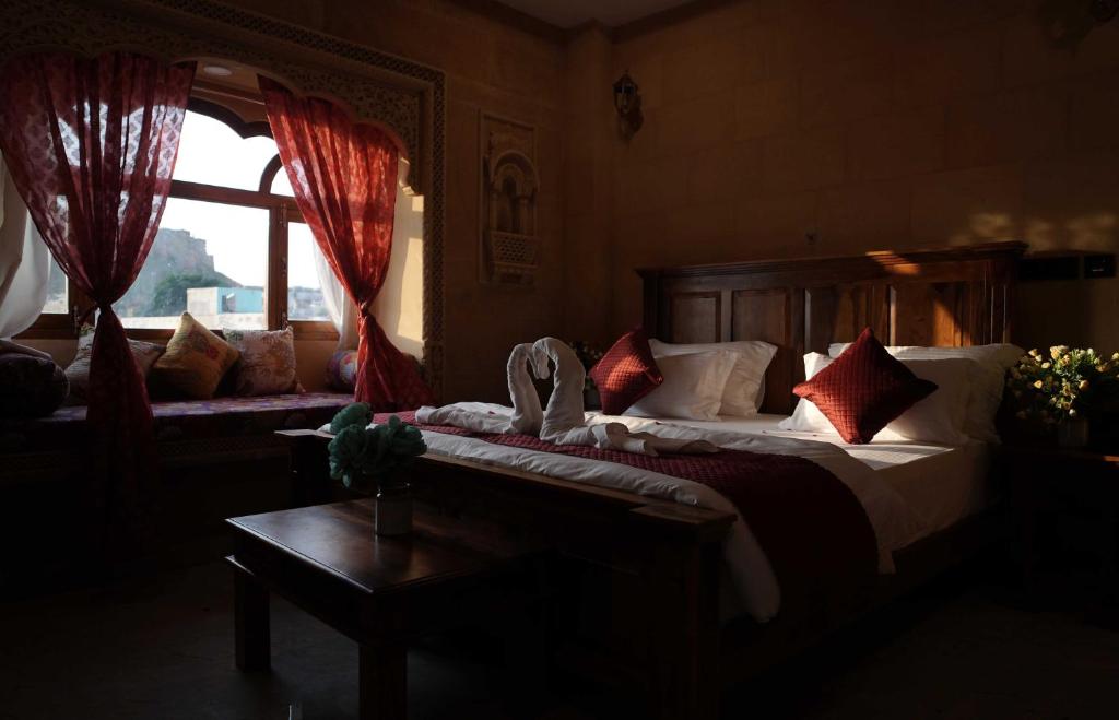 Postel nebo postele na pokoji v ubytování Hotel Golden Signature