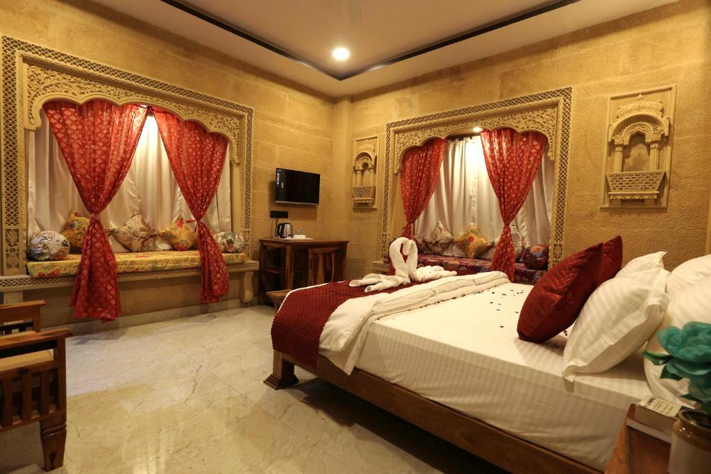 Postel nebo postele na pokoji v ubytování Hotel Golden Signature