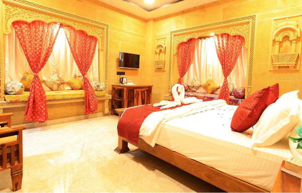 Postel nebo postele na pokoji v ubytování Hotel Golden Signature