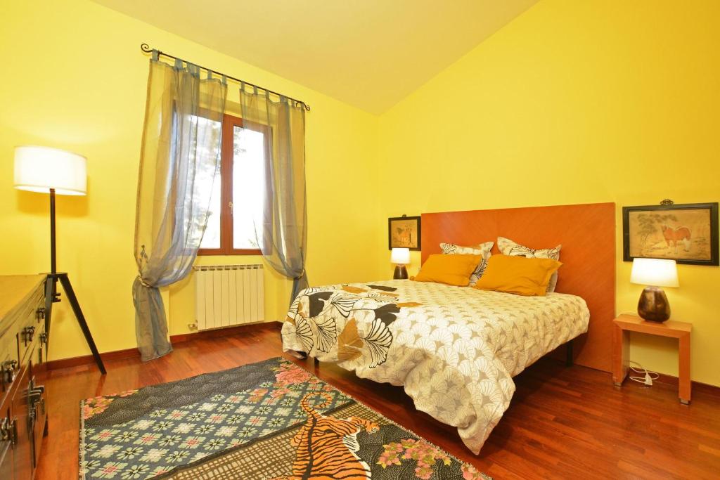 Łóżko lub łóżka w pokoju w obiekcie Certosa Homes