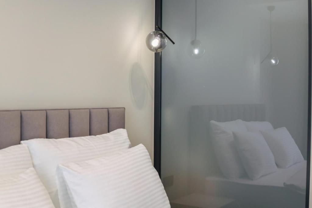 Postel nebo postele na pokoji v ubytování Adler Hotel