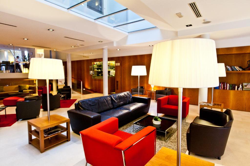Uma área de estar em Dal Moro Gallery Hotel