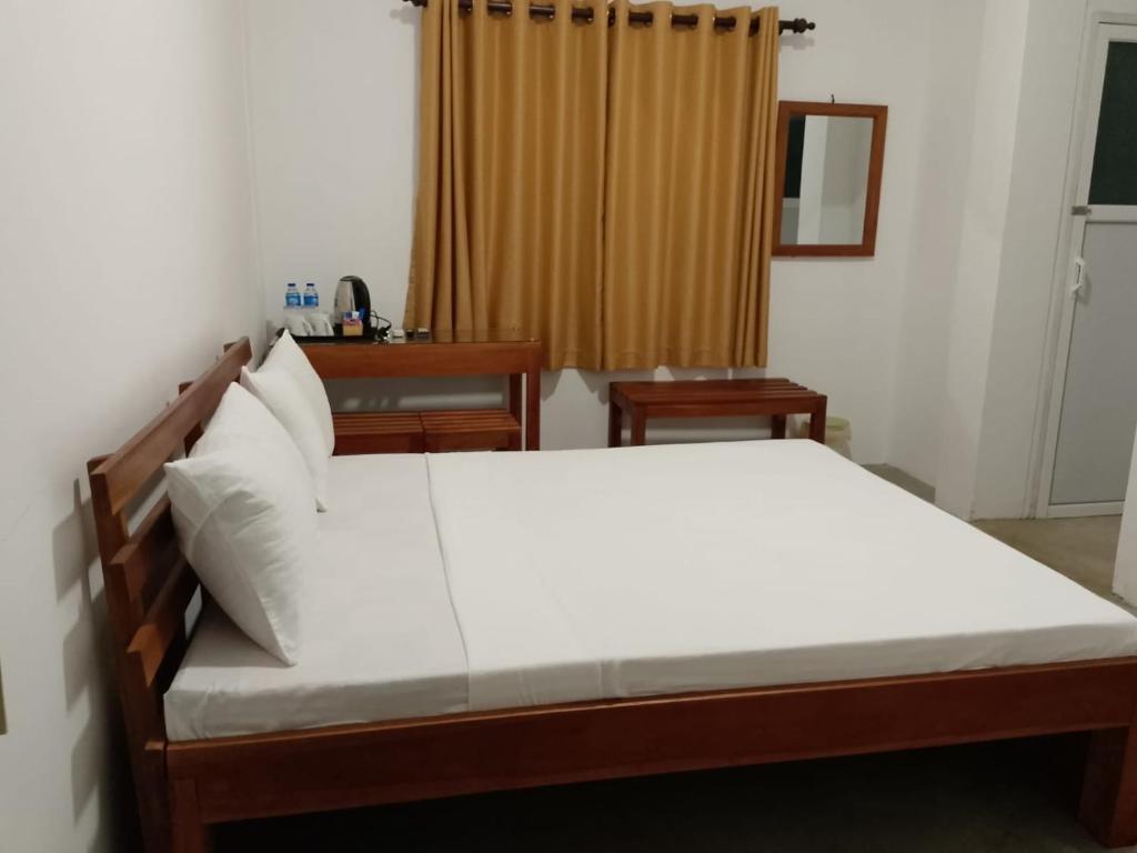 Postel nebo postele na pokoji v ubytování Seven Lotus Villa Kandy