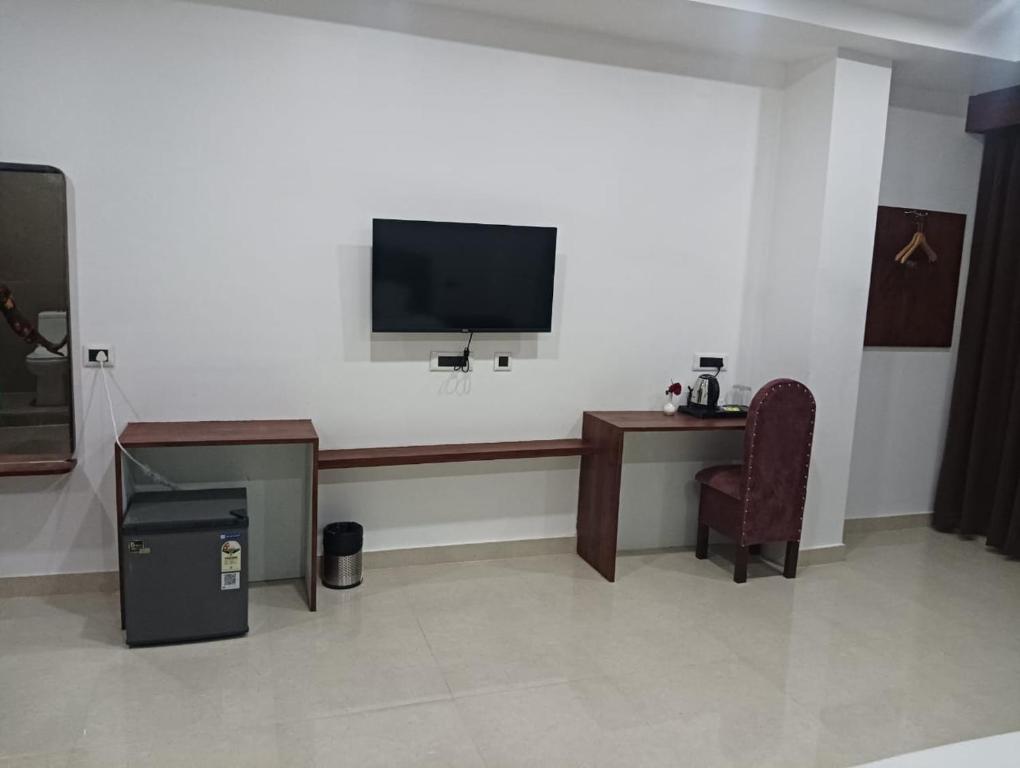 TV a/nebo společenská místnost v ubytování Hotel RKD Inn