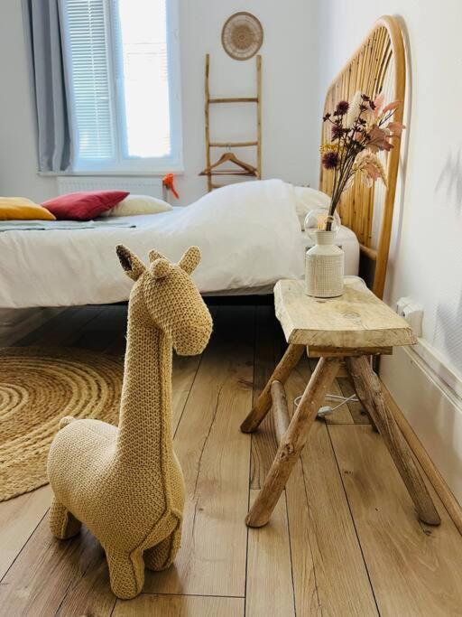 Posteľ alebo postele v izbe v ubytovaní Studio Girafe, style bohème et atypique, Curistes
